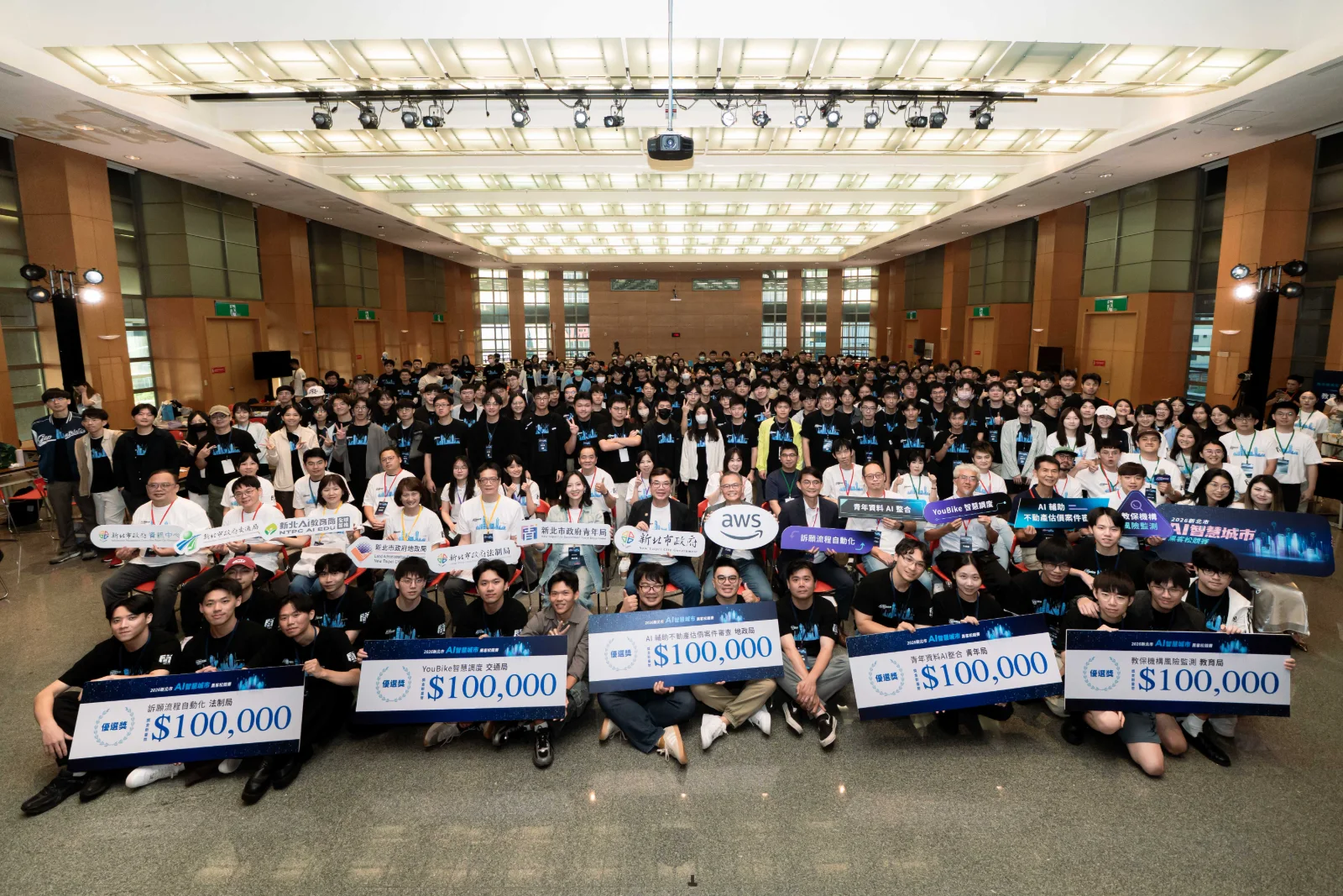 All finalists and the five winning teams of the 2026 New Taipei AI Smart City Hackathon in the City Hall auditorium